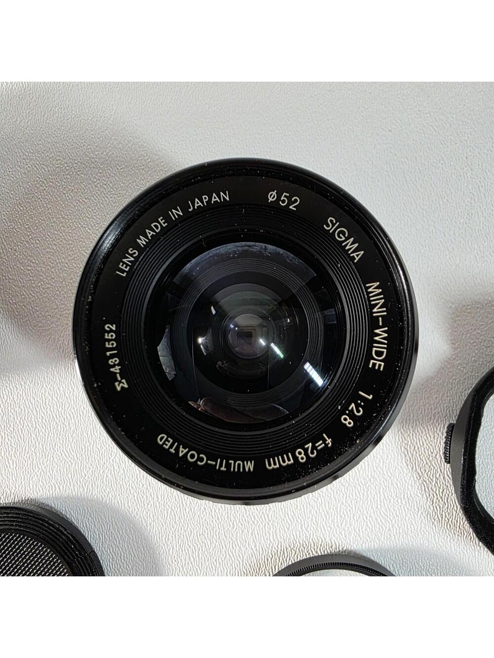 SIGMA 28mm f/ 2.8 lens mini wide, OLYMPUS OM Mount W/Case, Caps & Hood